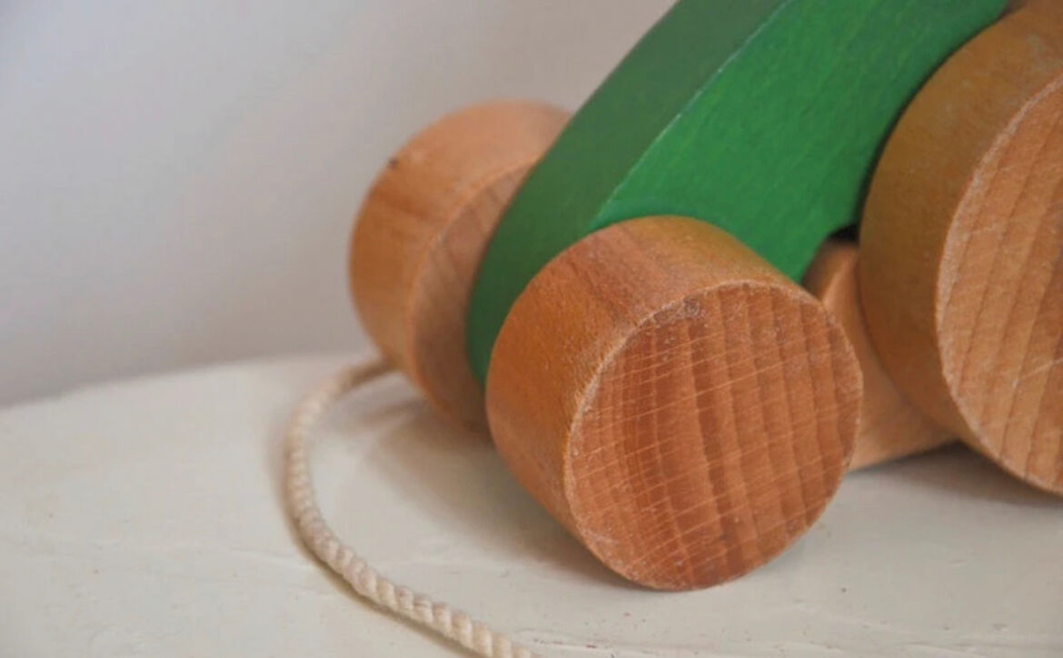 Vintage pulling frog wooden toy