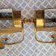 Pair of wall sconces in gilded brass 1970