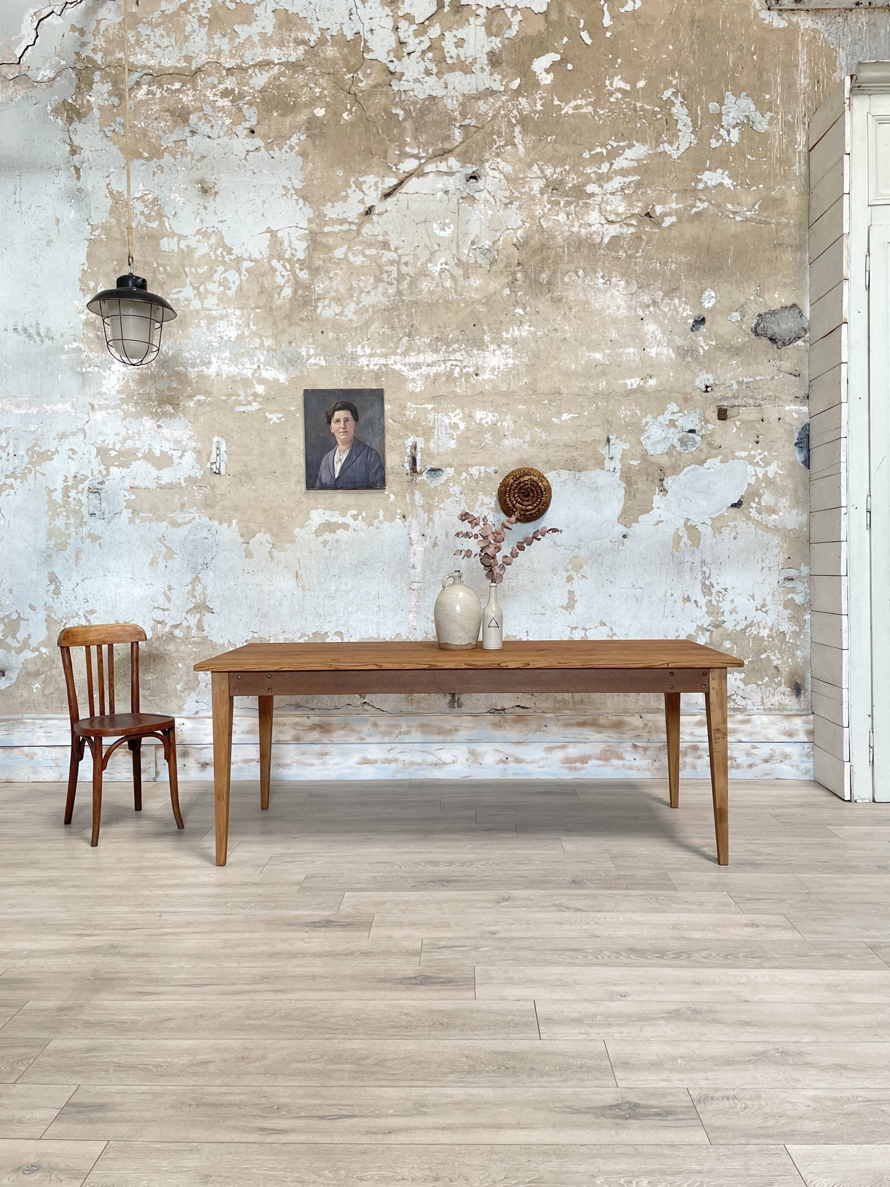 Vintage farm table with spindle legs.