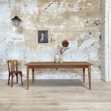 Vintage farm table with spindle legs.