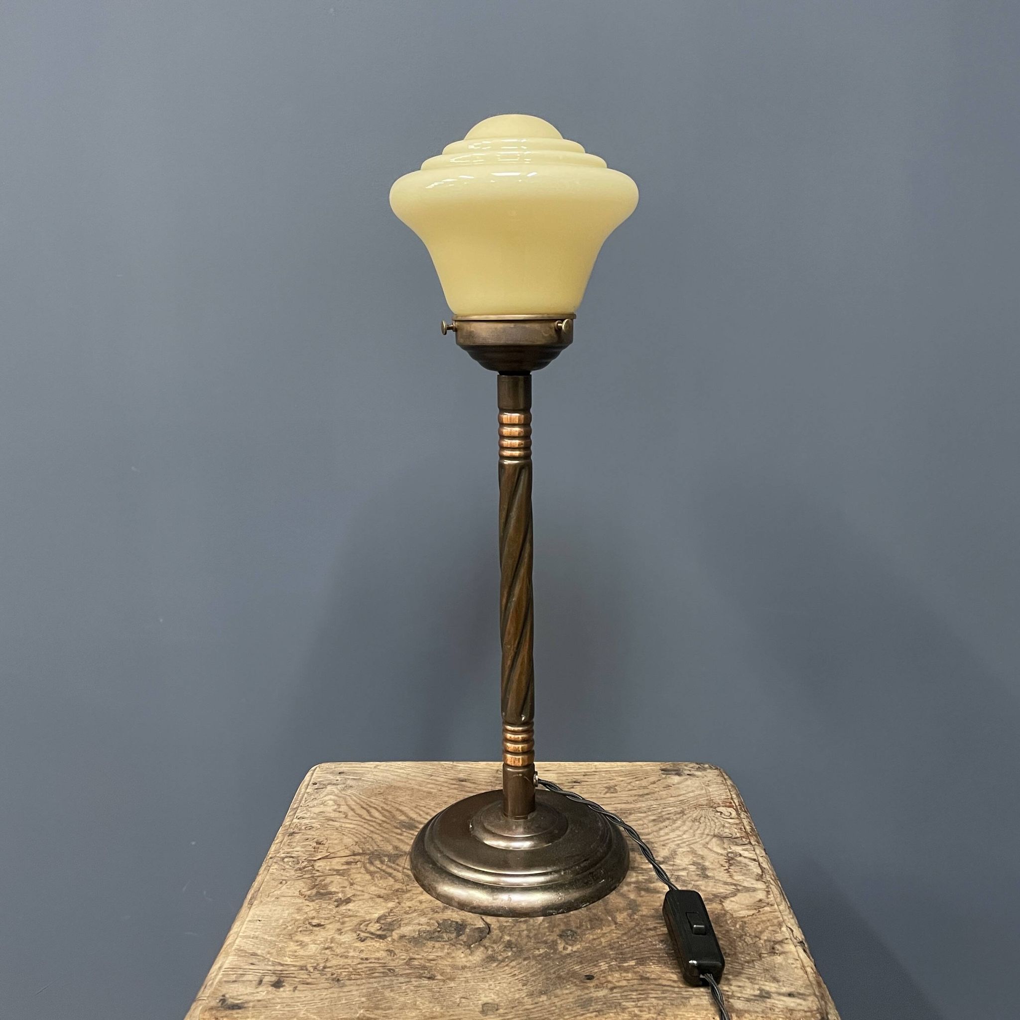 Standing copper table lamp with glass shade