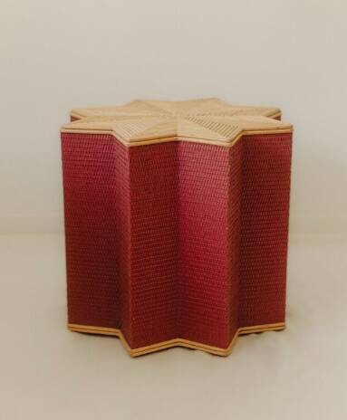 Small star-shaped side table in pink rattan