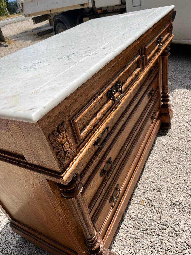 Commode with a white marble top