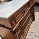 Commode with a white marble top