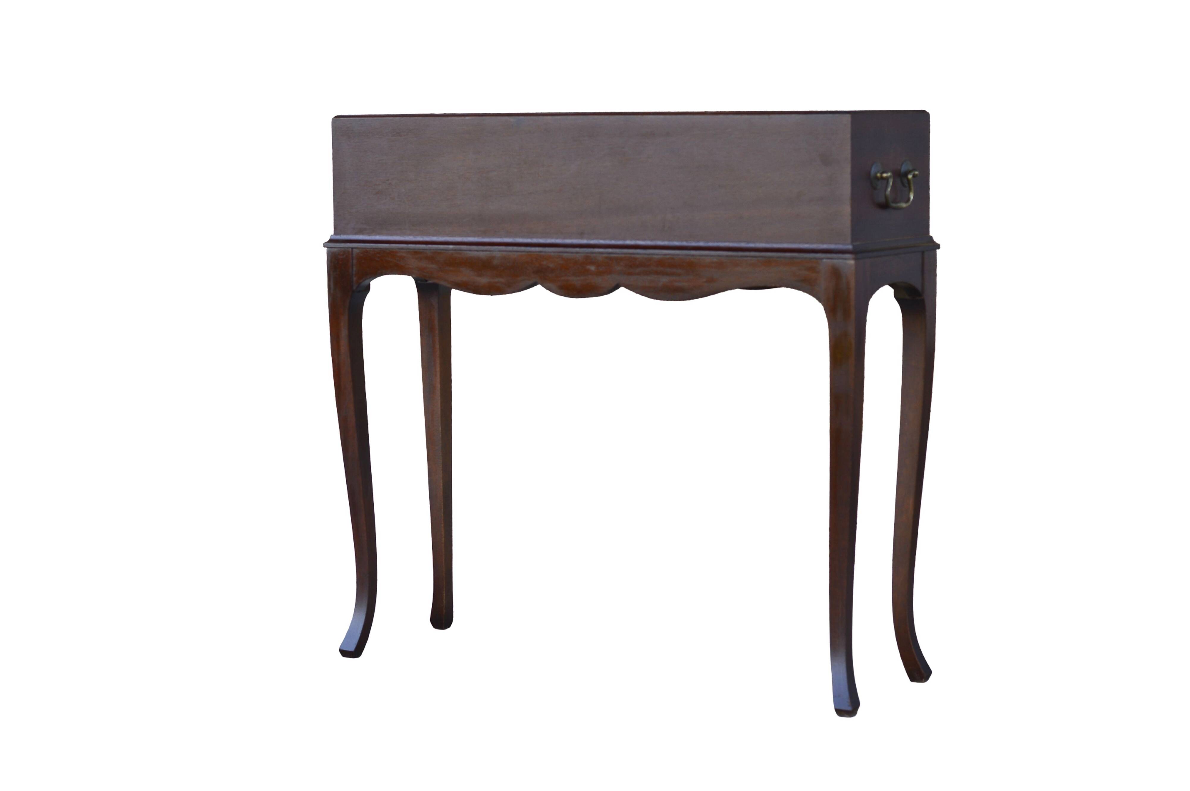 Elegant mid-century teak planter with tray.