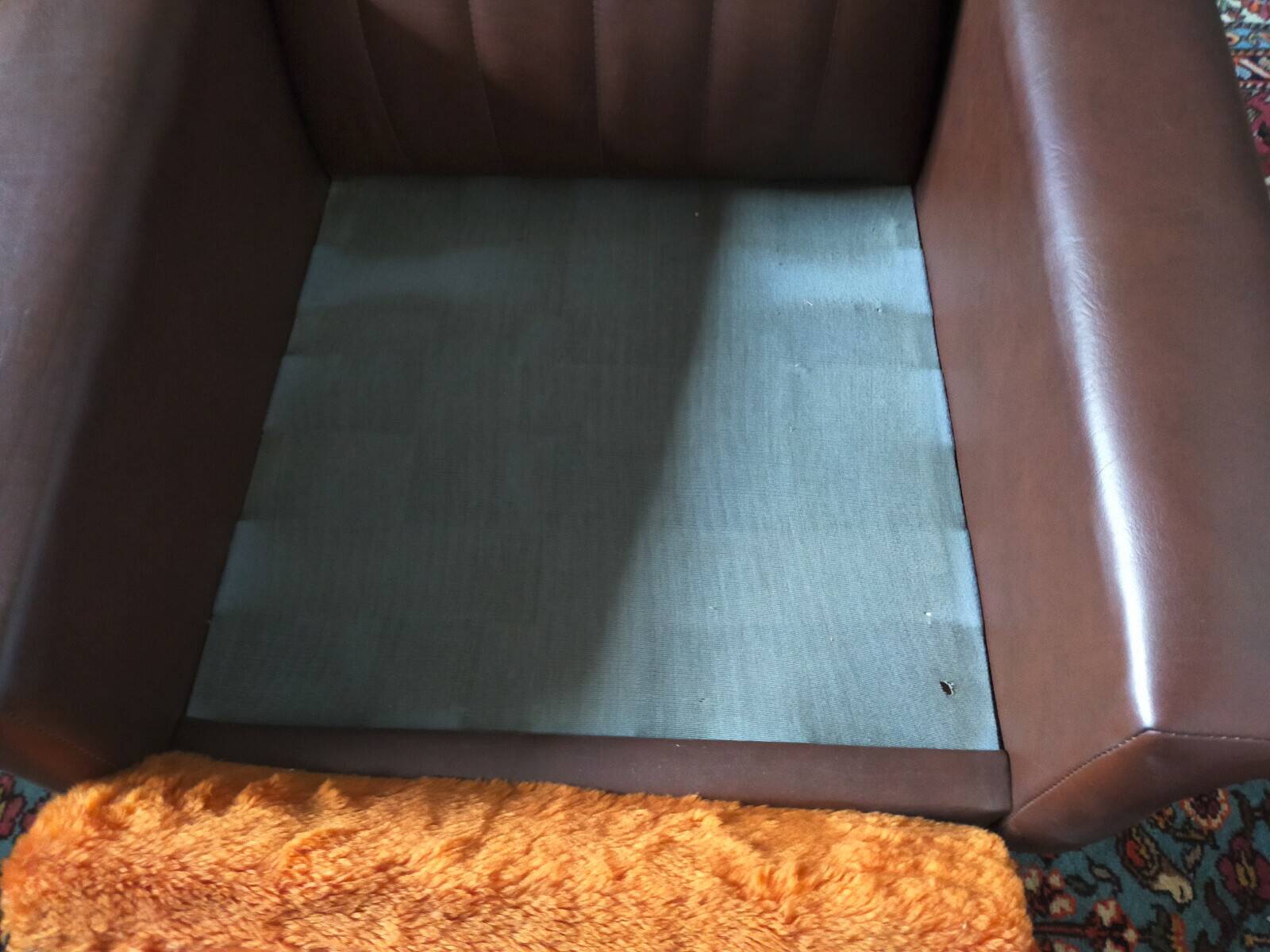 Vintage armchair in faux leather