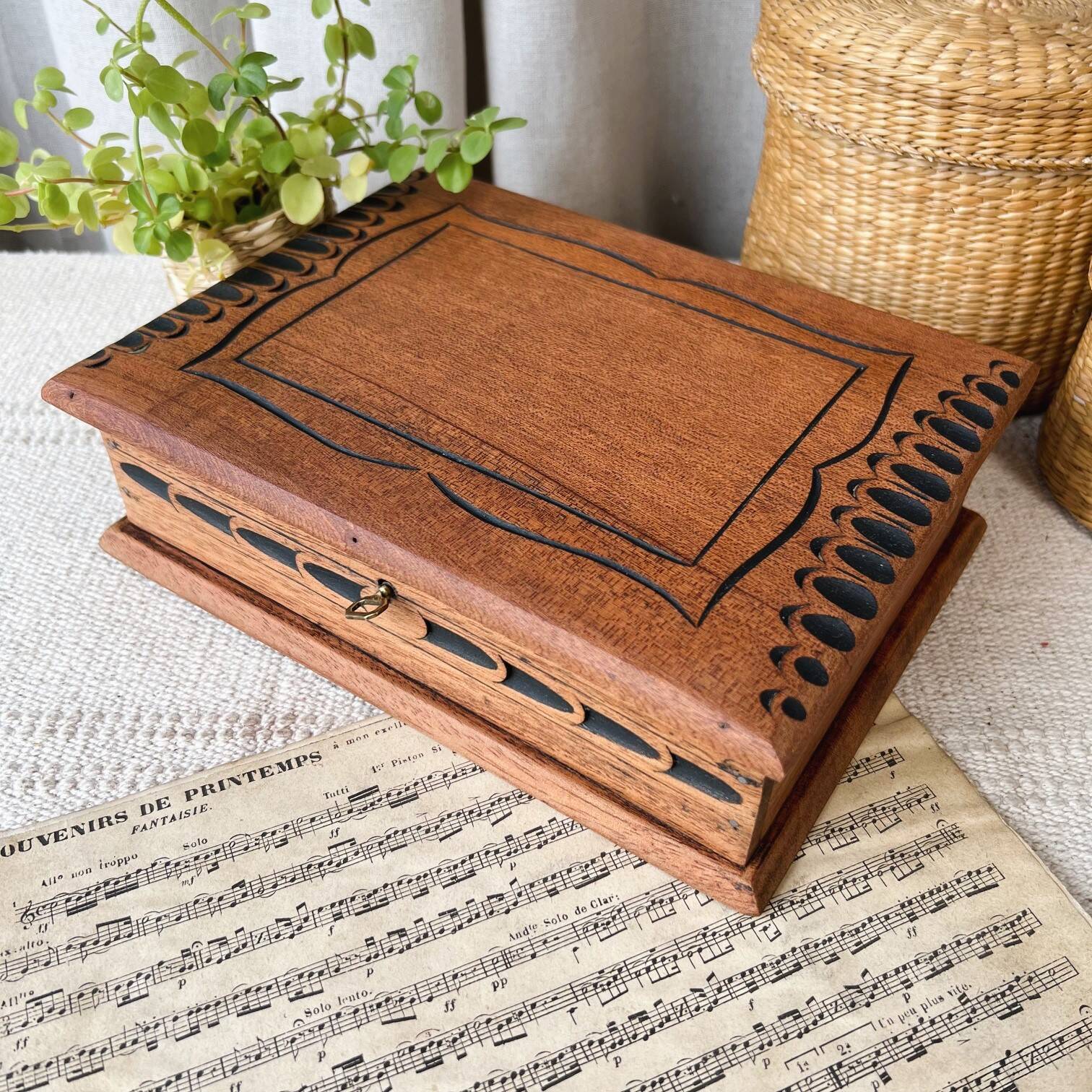 Carved wooden box with key