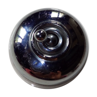 Switch made of pocelaine and aluminium