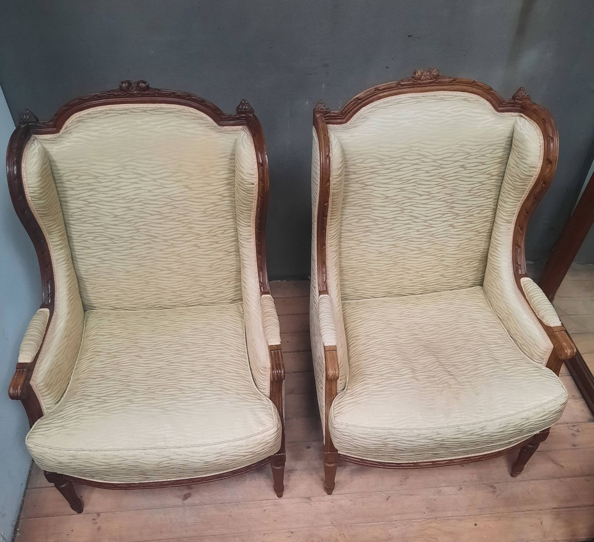 Pair of wingback armchairs in Louis XVI style