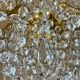 golden bronze chandelier in Louis XVI style