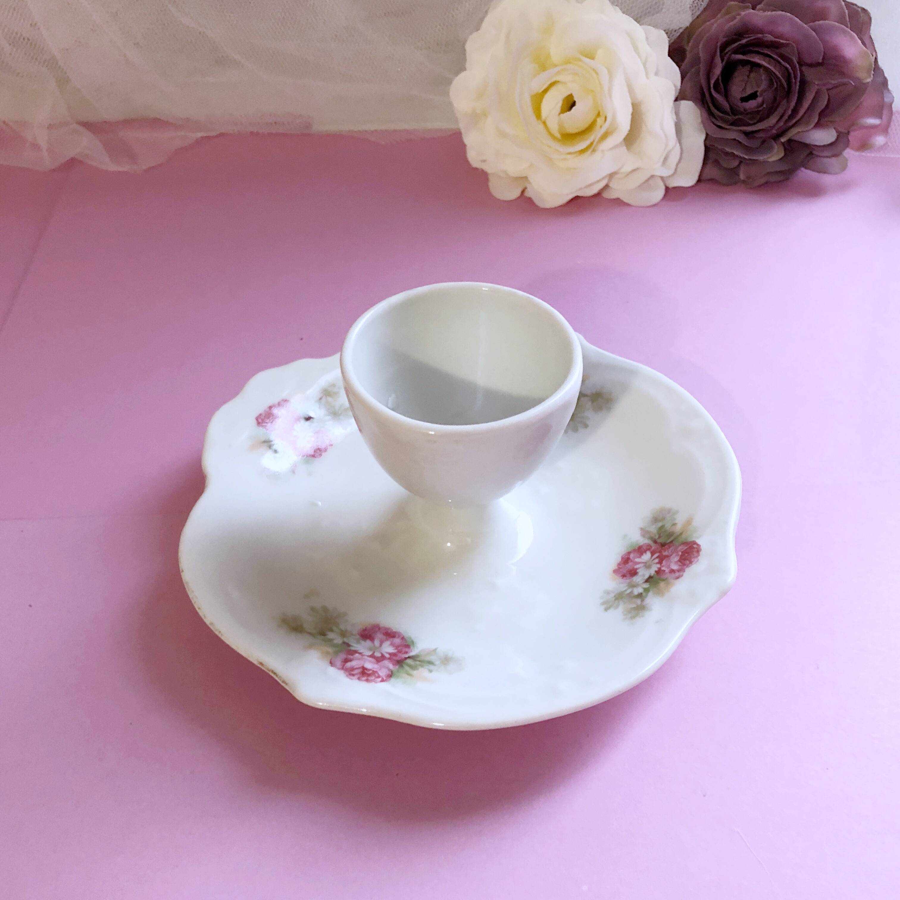 Porcelain egg cup with shabby chic style floral bouquet decoration Romanticism