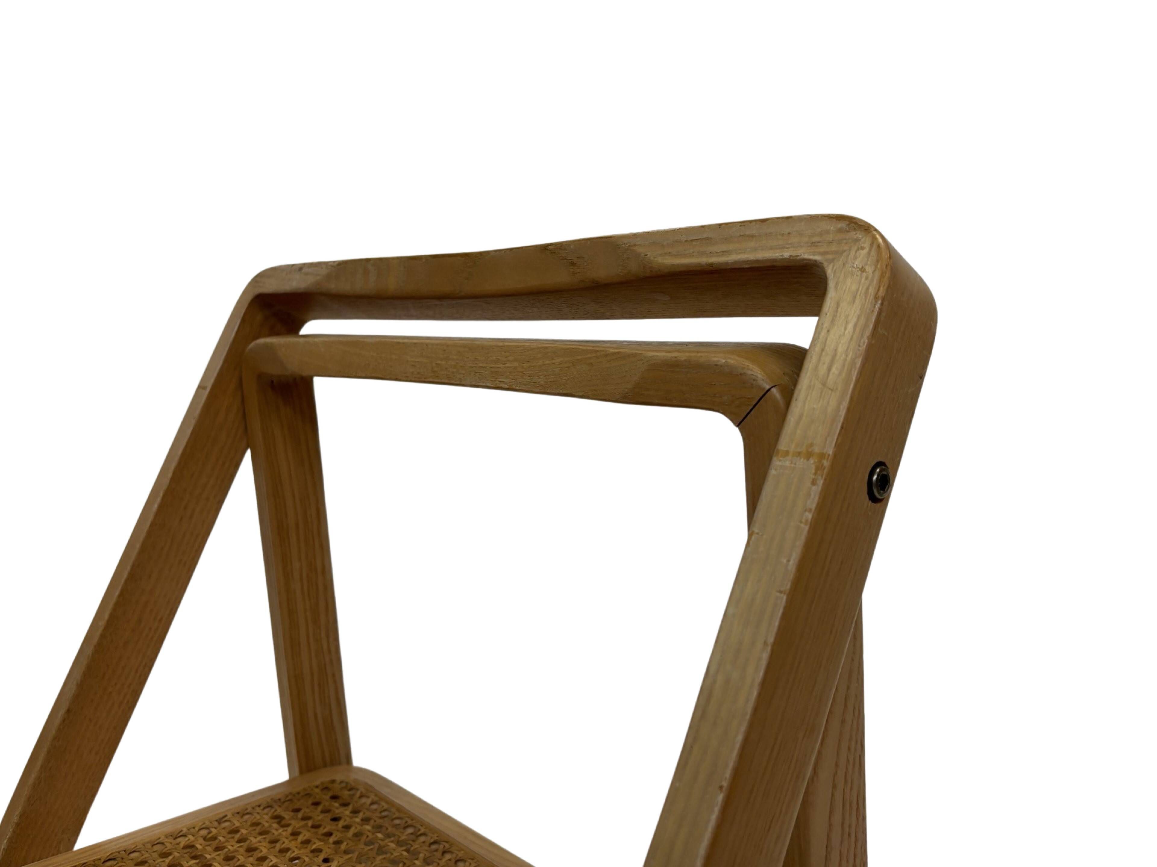 Ensemble vintage de 4 chaises pliantes, design en sangle et bois, années 1970