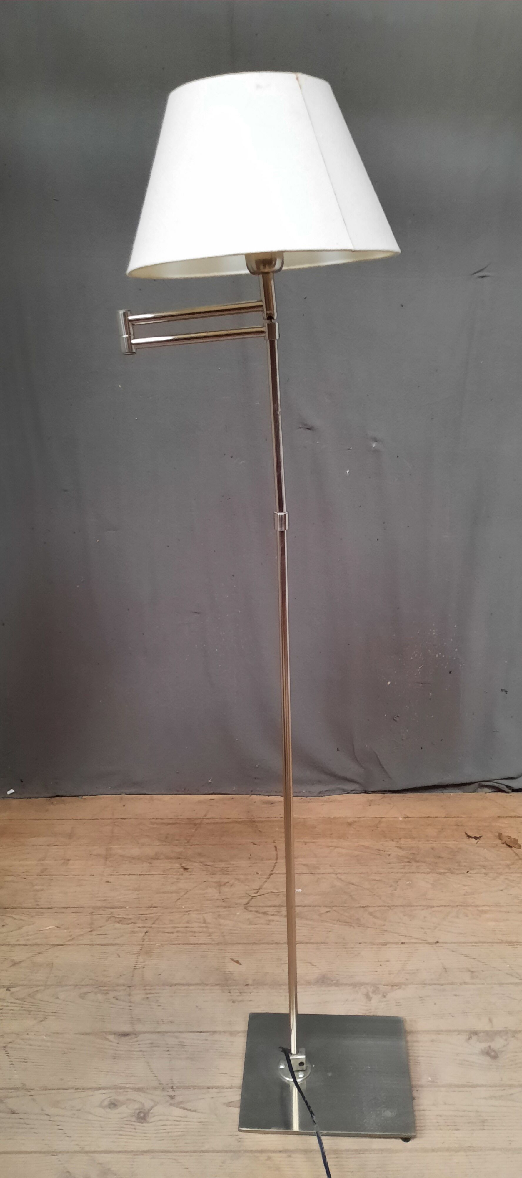 Brushed steel standing lamp