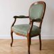 Louis XV Voltaire armchair in wood and green fabric