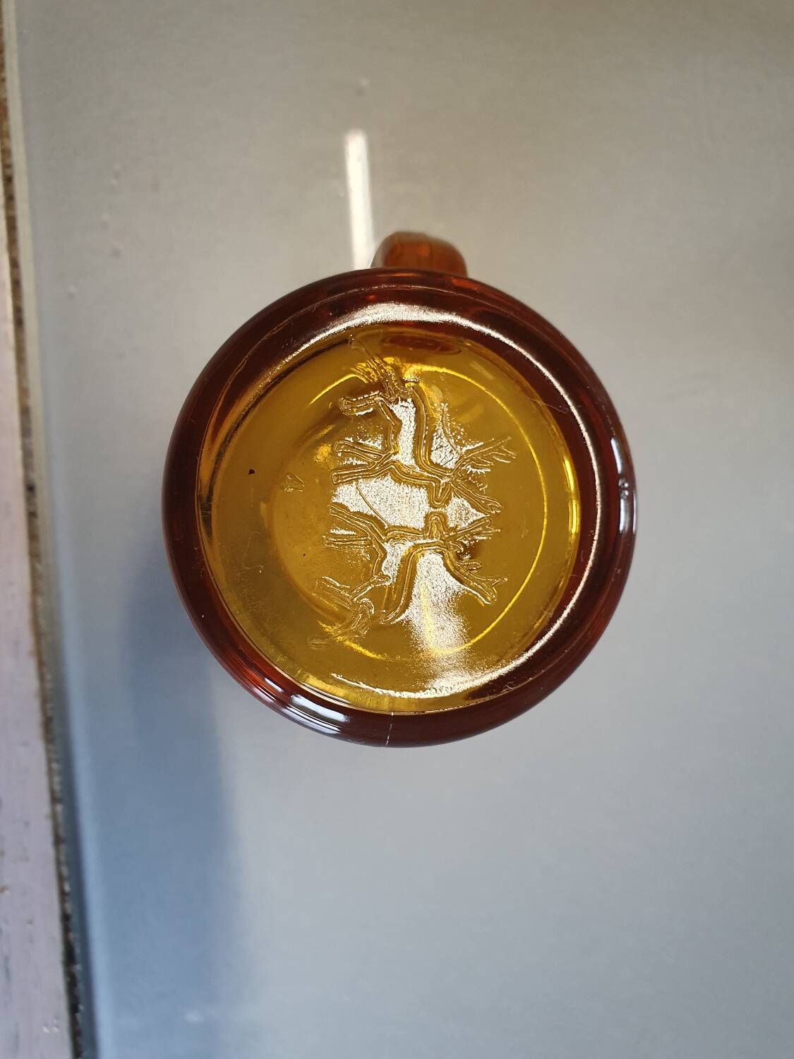Set of original vintage small amber glass glasses.