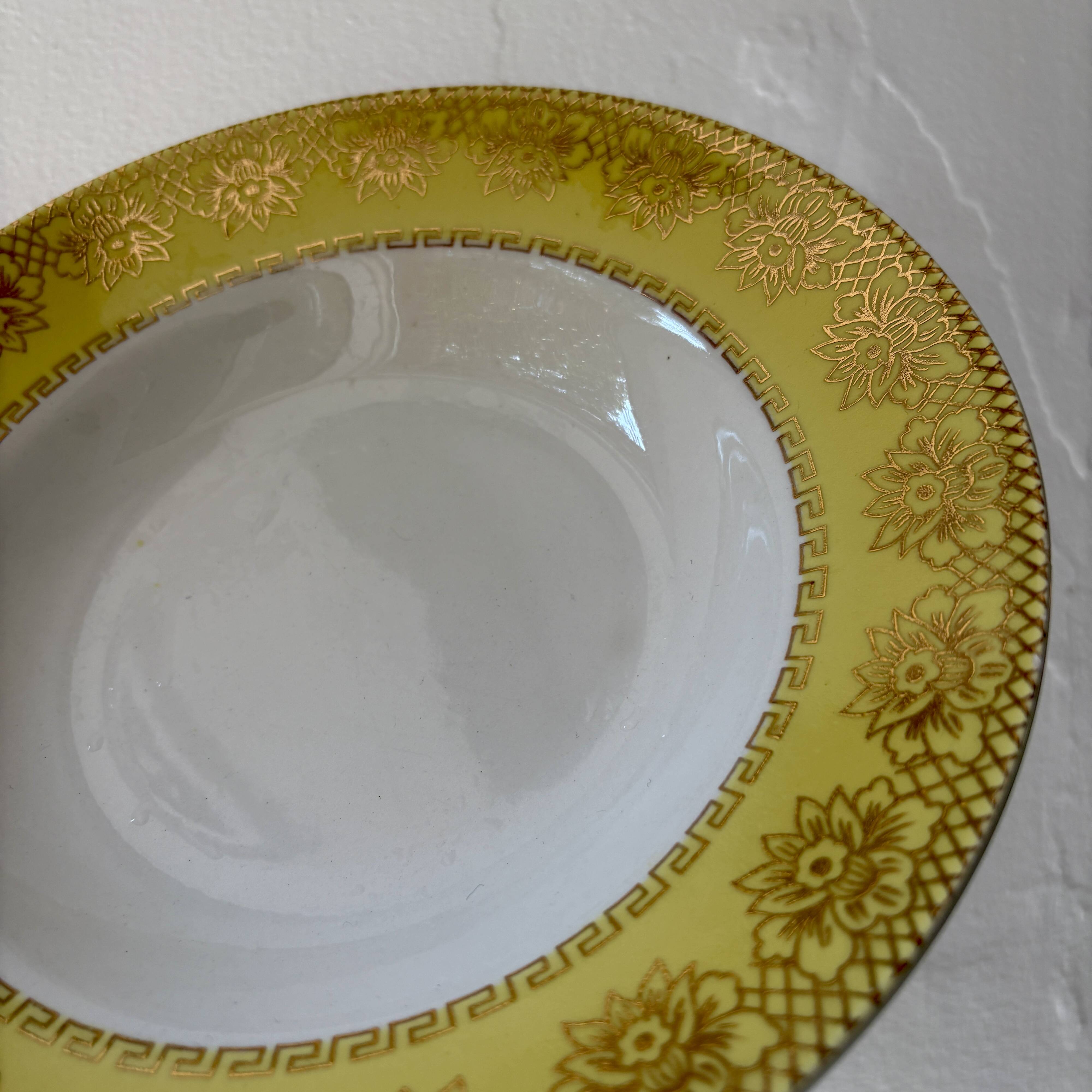 Set of 12 vintage yellow, white and gold soup plates