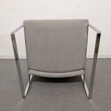 Pair of designer armchairs