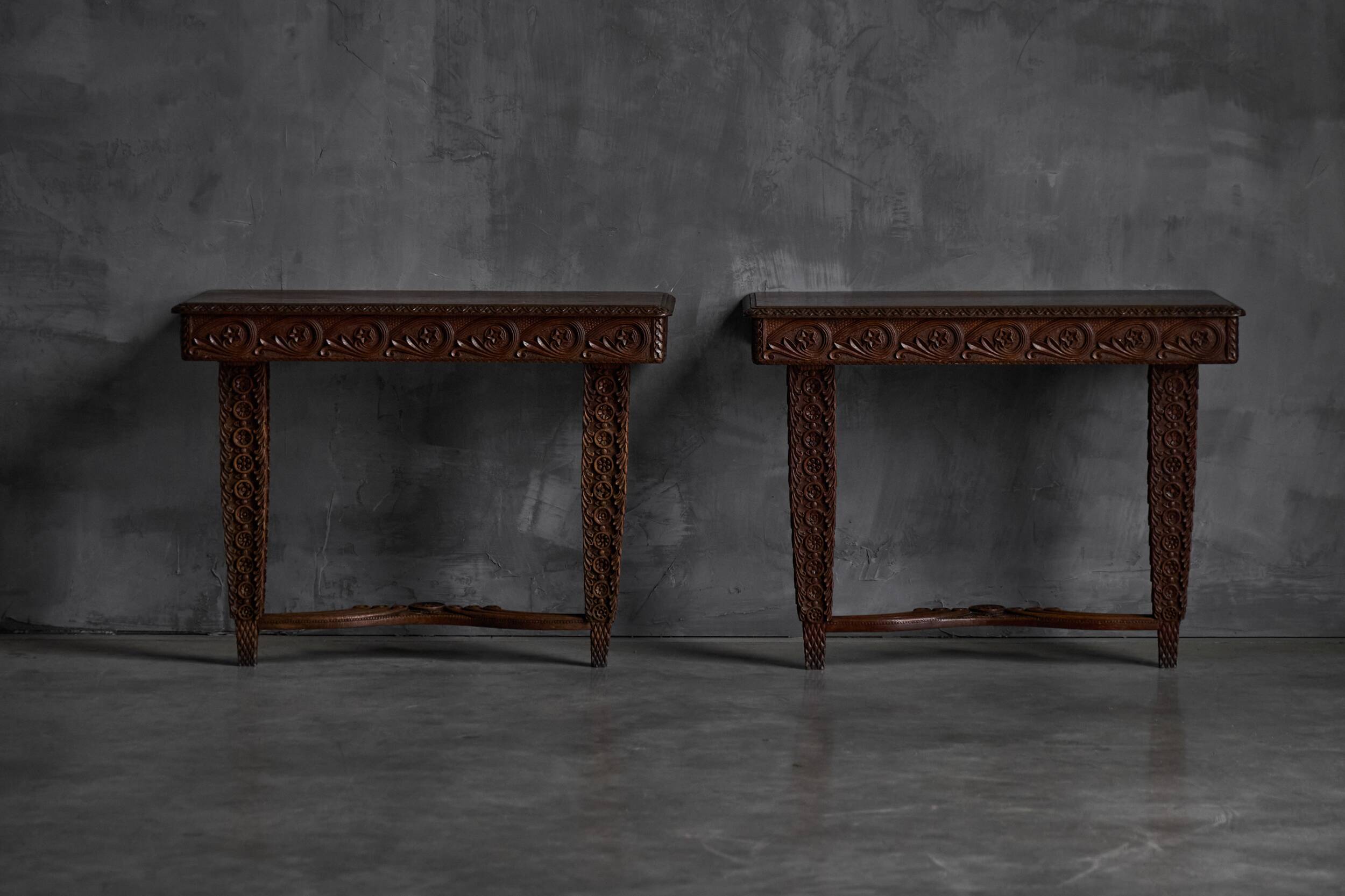 Hand-carved ornate wooden console tables, France, late 19th century