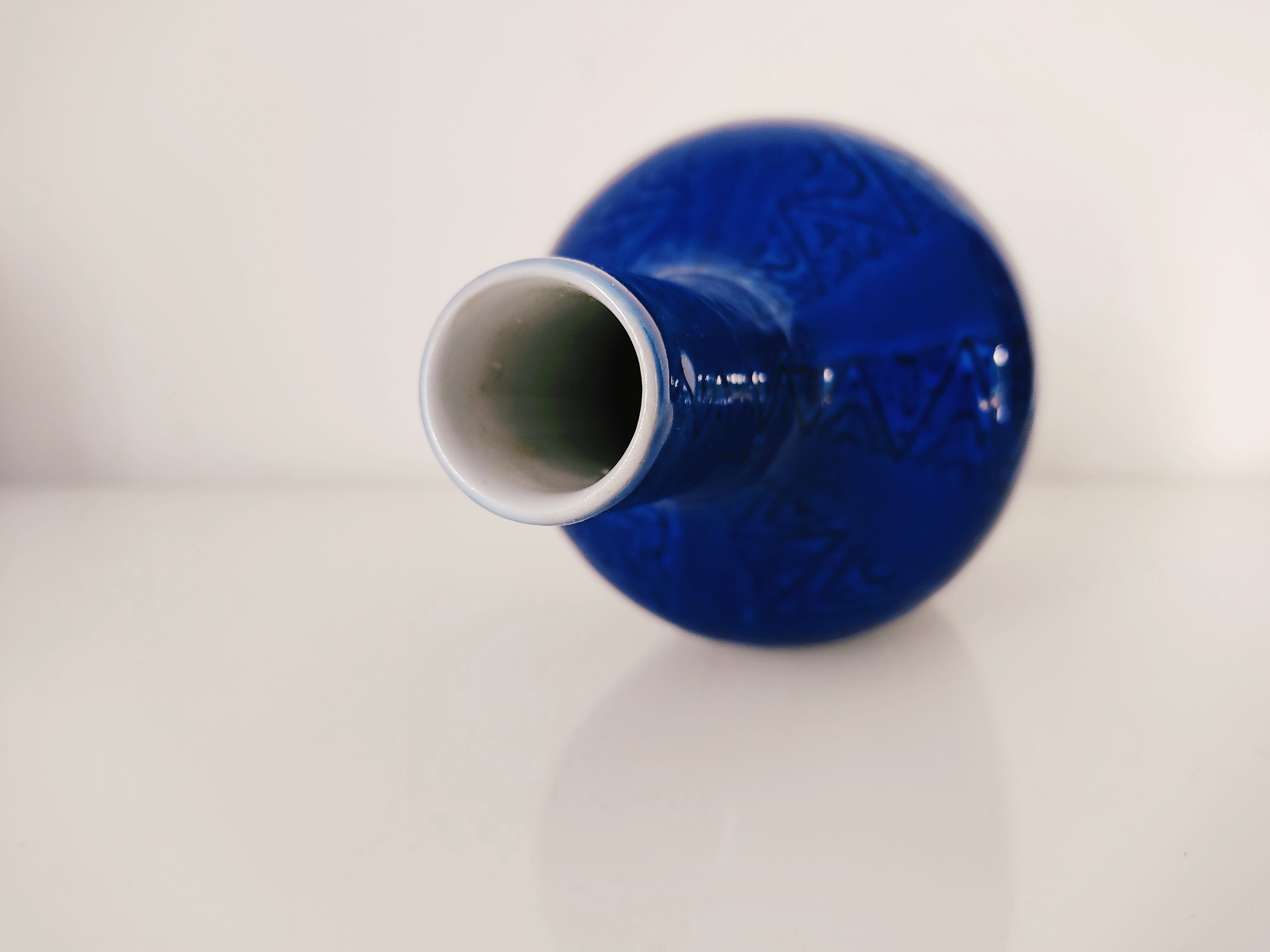 Blue vase geometric incised decoration