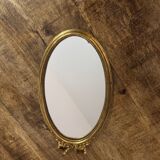Oval gold knot mirror