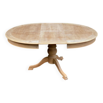 Table à manger ronde extensible pied central rénovée en bois brut XXème