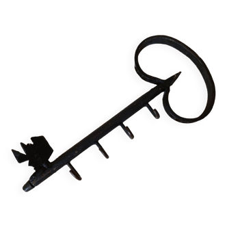 Old wall key holder in the shape of a vintage metal key 4 hooks