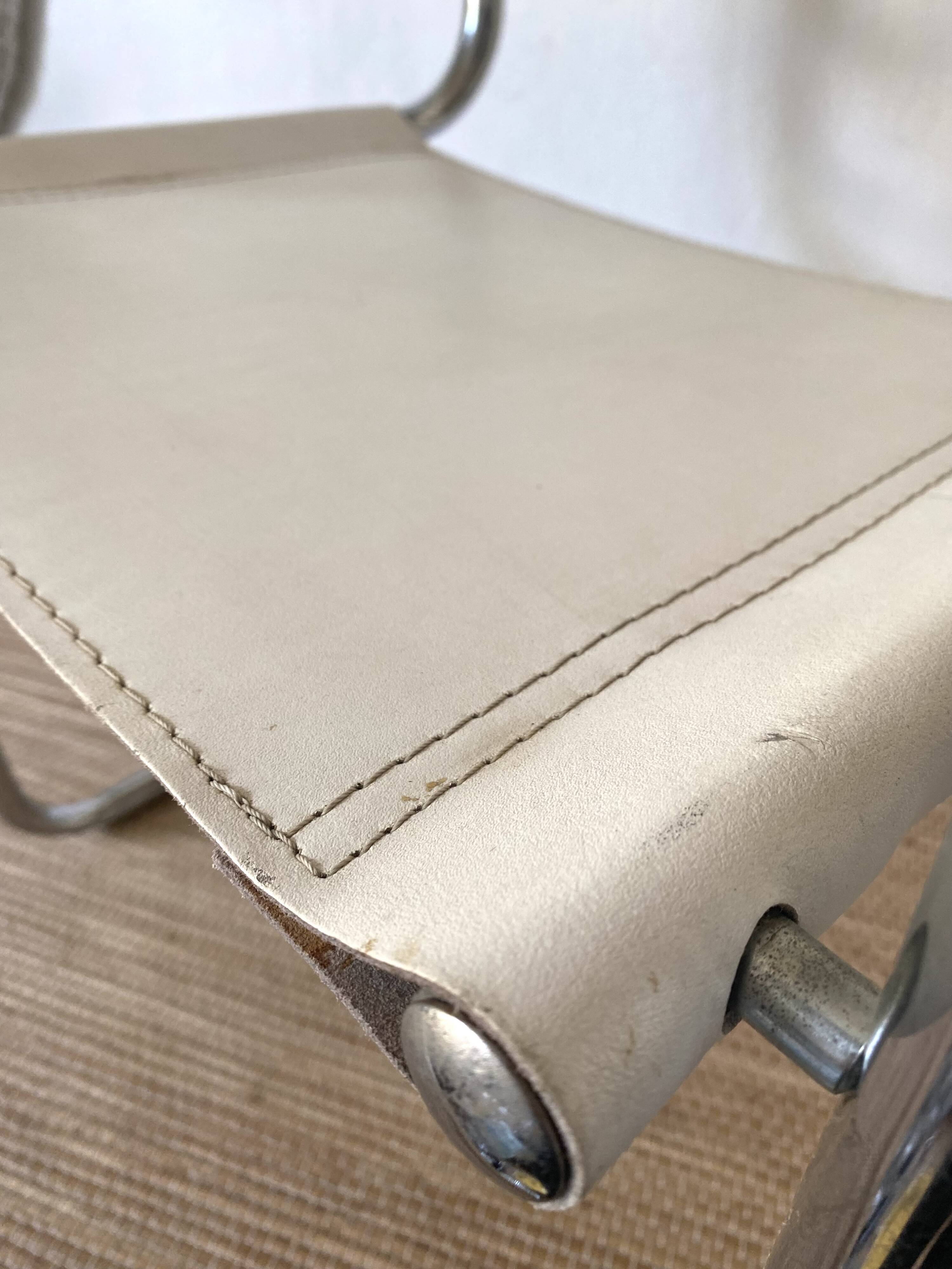 Matteo Grassi style faux leather and chrome armchair