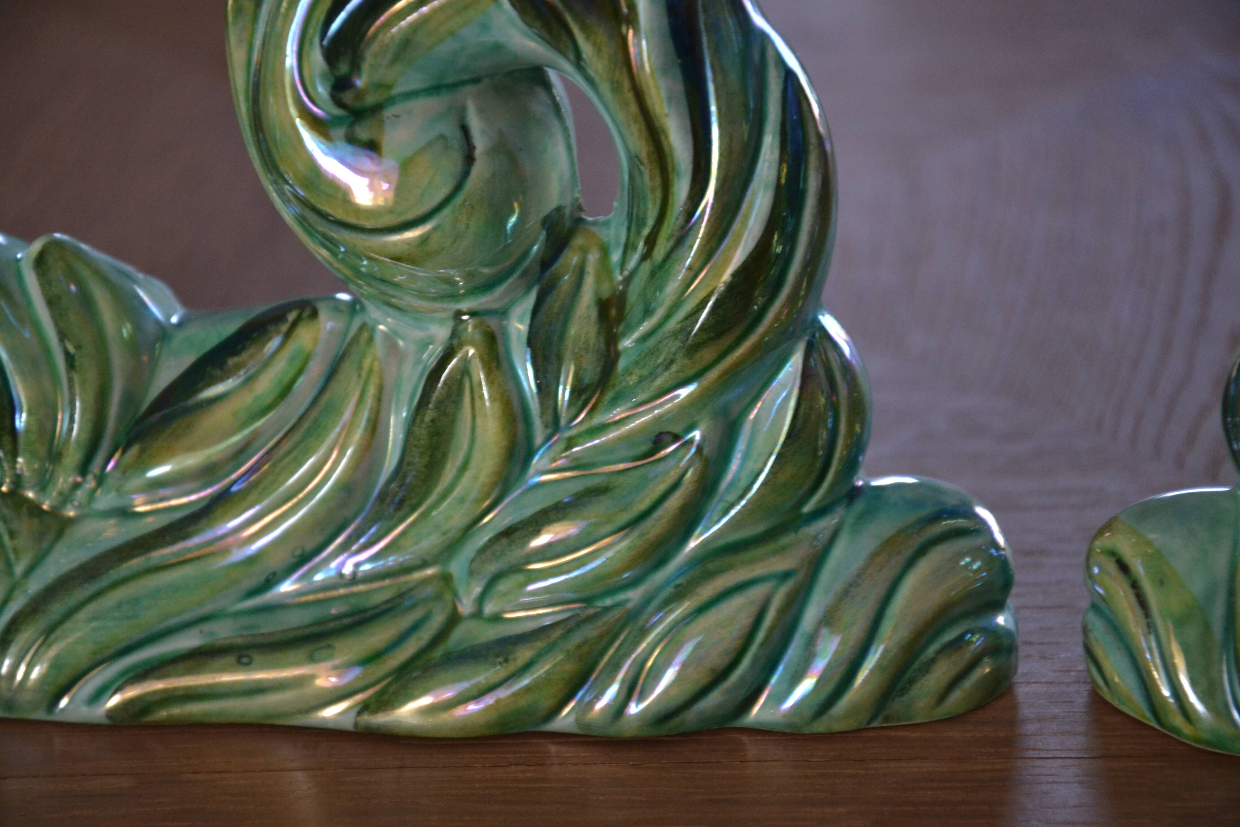 Pair of iridescent green ceramic Art Deco candlesticks