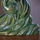 Pair of iridescent green ceramic Art Deco candlesticks