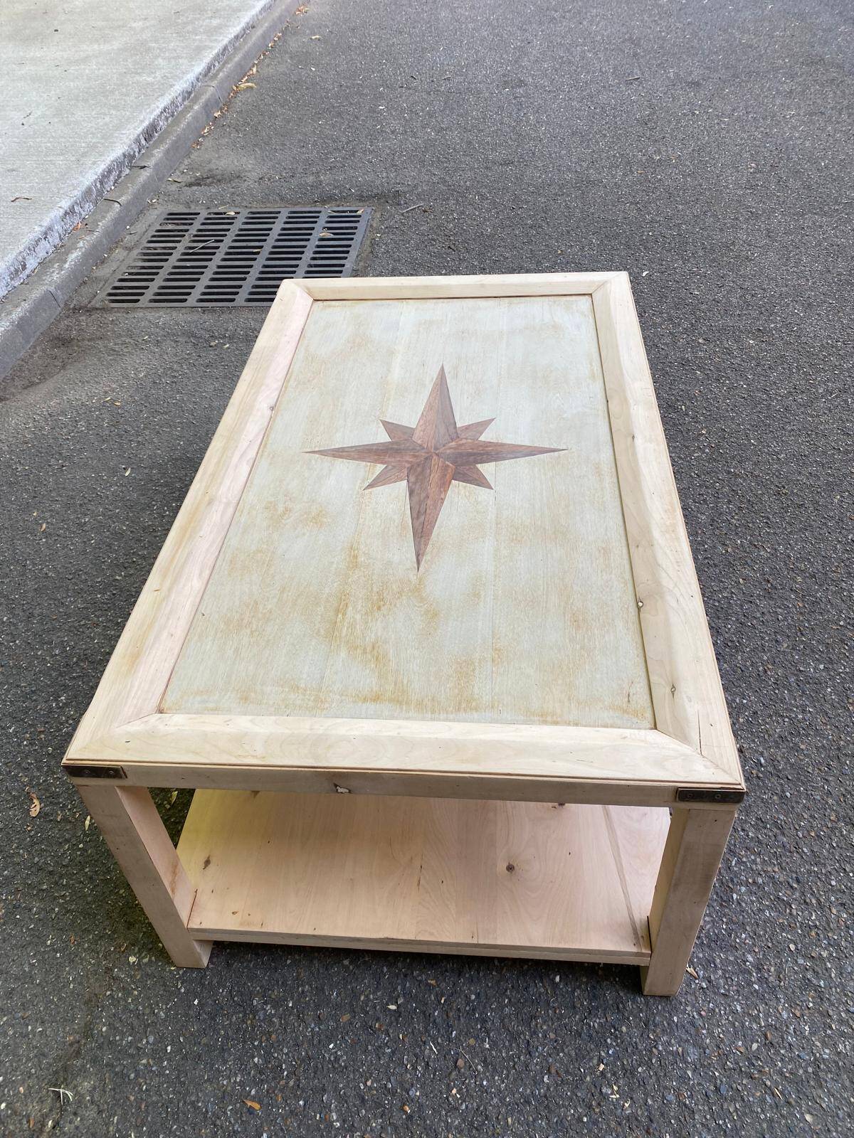 Renovated solid wood coffee table in chic country seaside style.