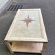 Renovated solid wood coffee table in chic country seaside style.
