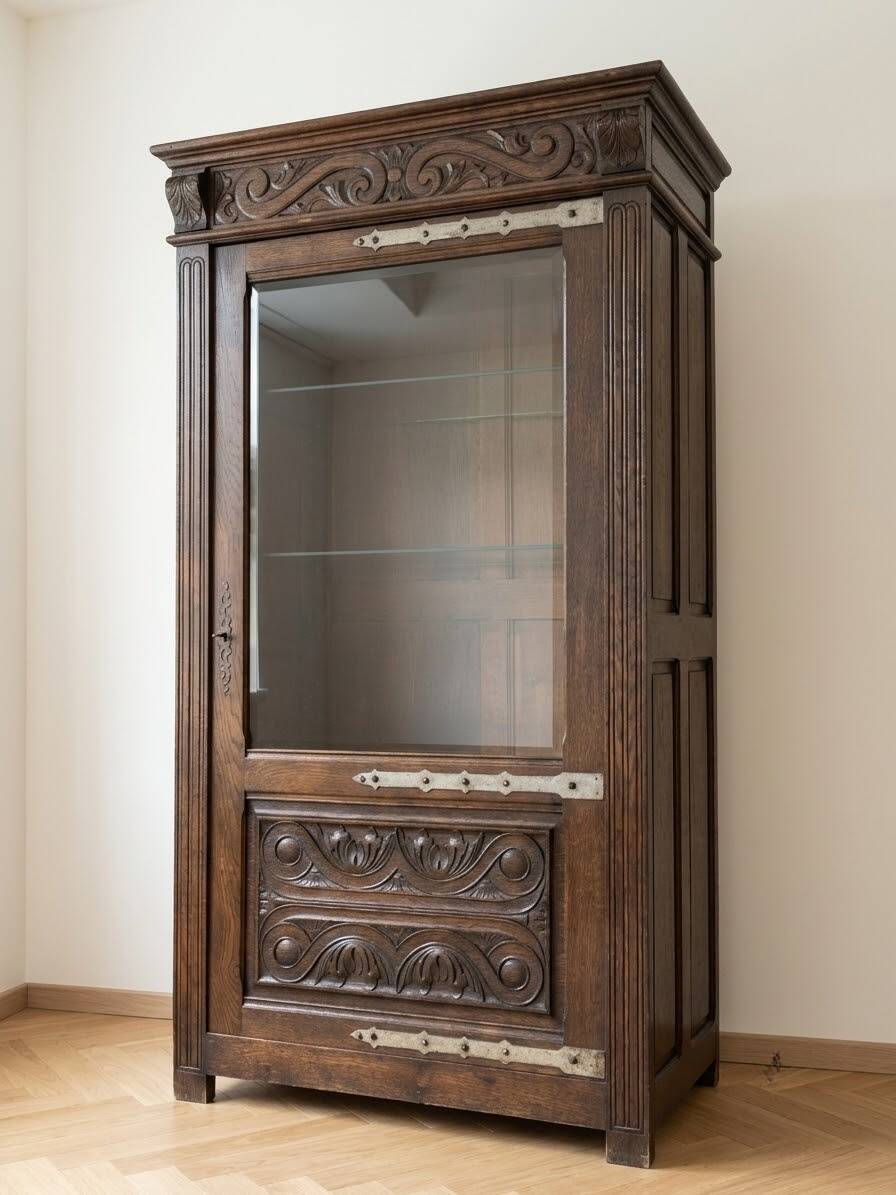 Antique oak display cabinet, solid, in the style of Spanish Renaissance, with sculpture and wrought iron.
