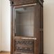 Antique oak display cabinet, solid, in the style of Spanish Renaissance, with sculpture and wrought iron.
