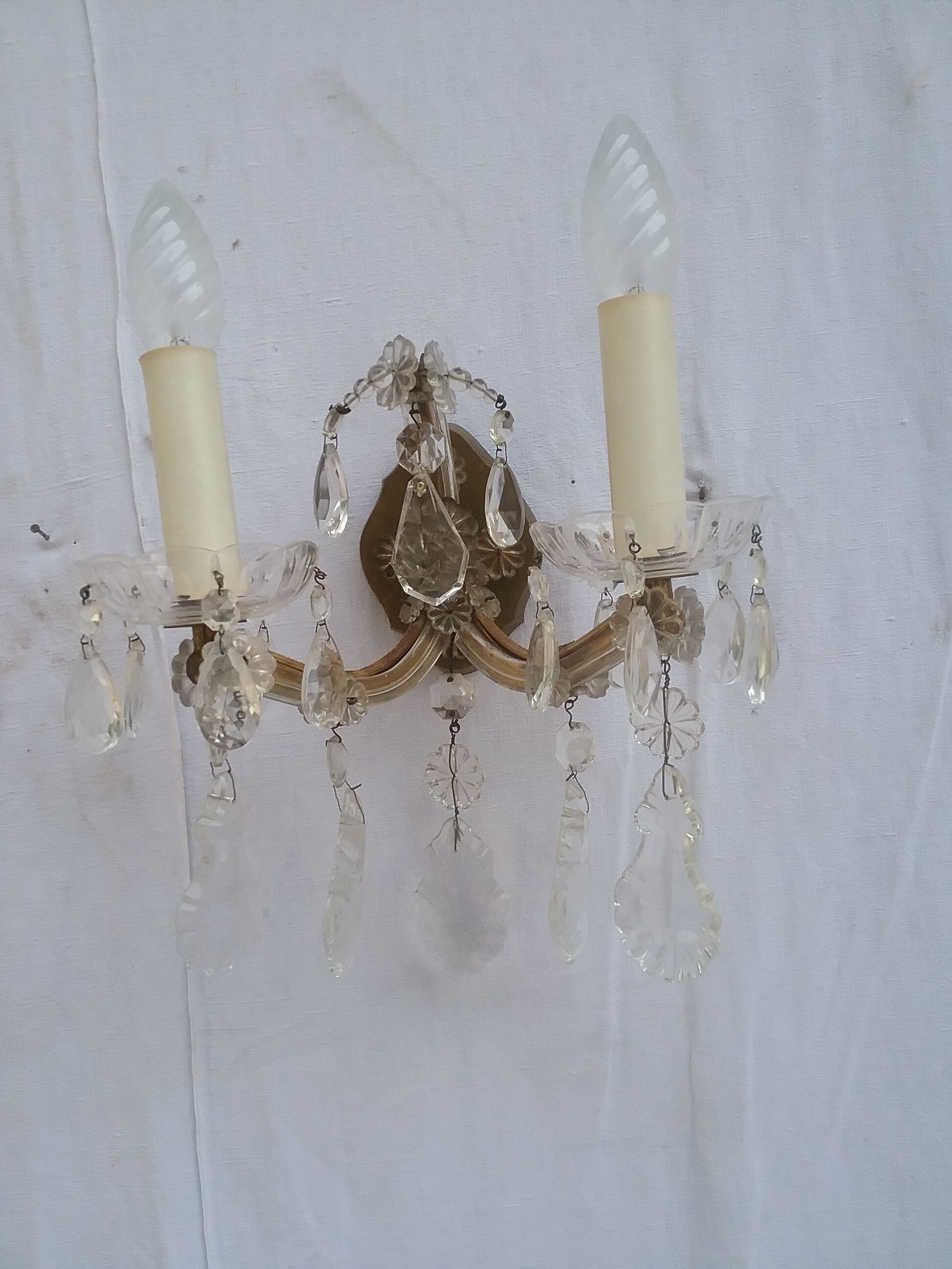 Pair of stamped wall light