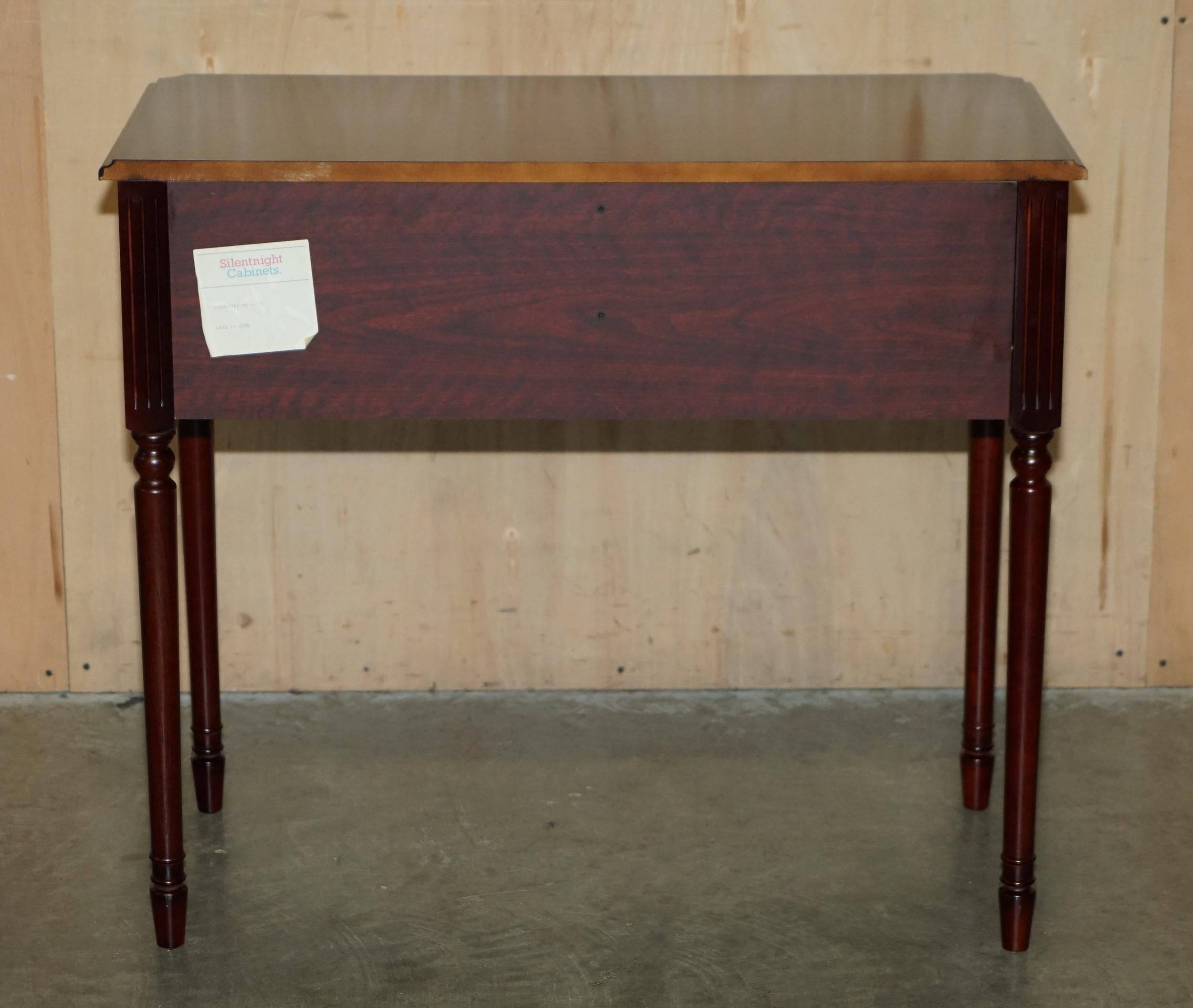 Small console with two drawers in hardwood finish.