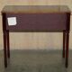 Small console with two drawers in hardwood finish.