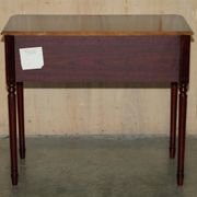 Small console with two drawers in hardwood finish.