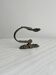 Antique black patinated metal coat hook.