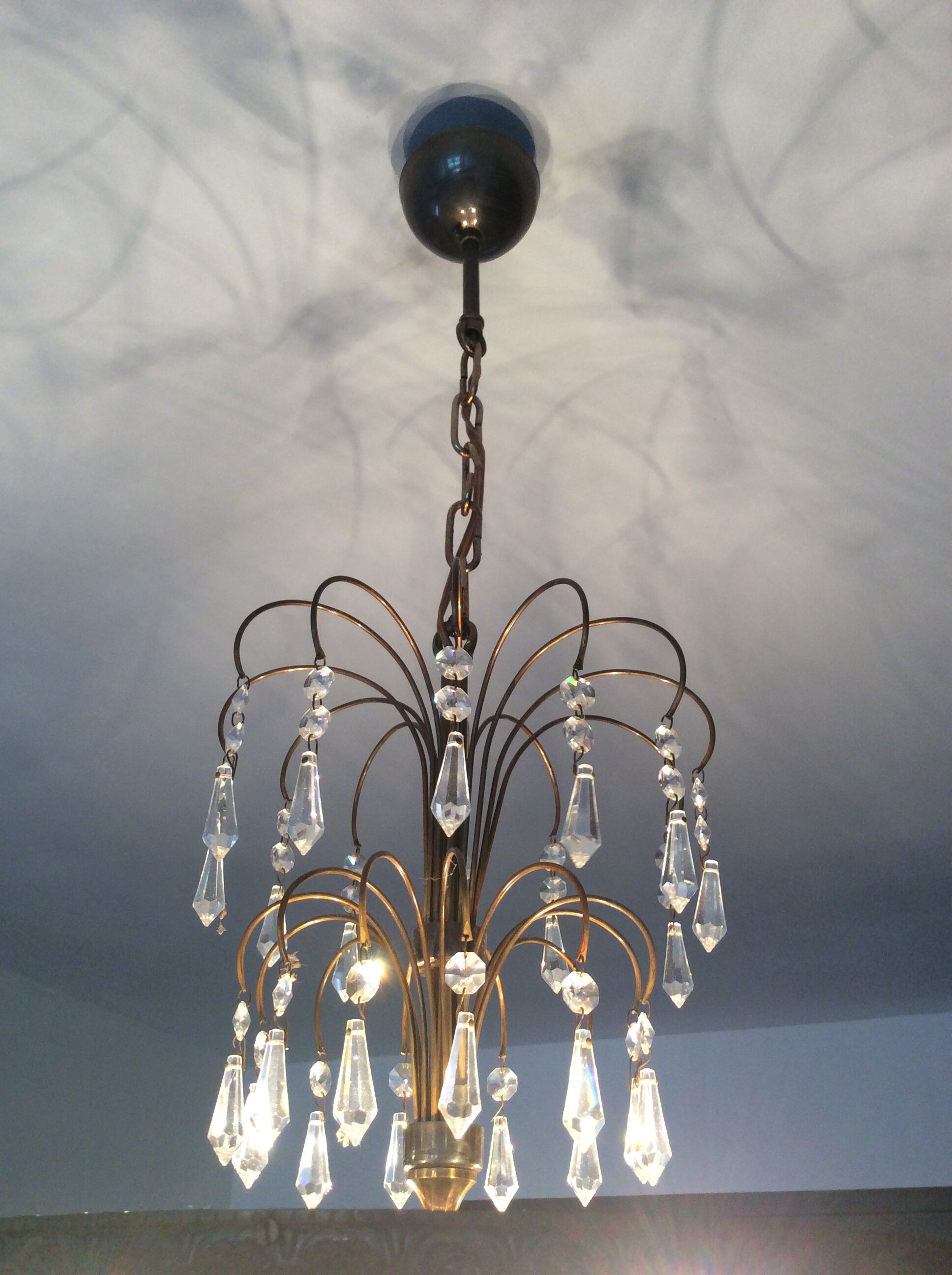 Chandelier cascading crystal and bronze tassels