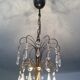 Chandelier cascading crystal and bronze tassels