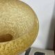 Antique Art Deco yellow-gold speckled glass globe by Clichy for lighting fixture.