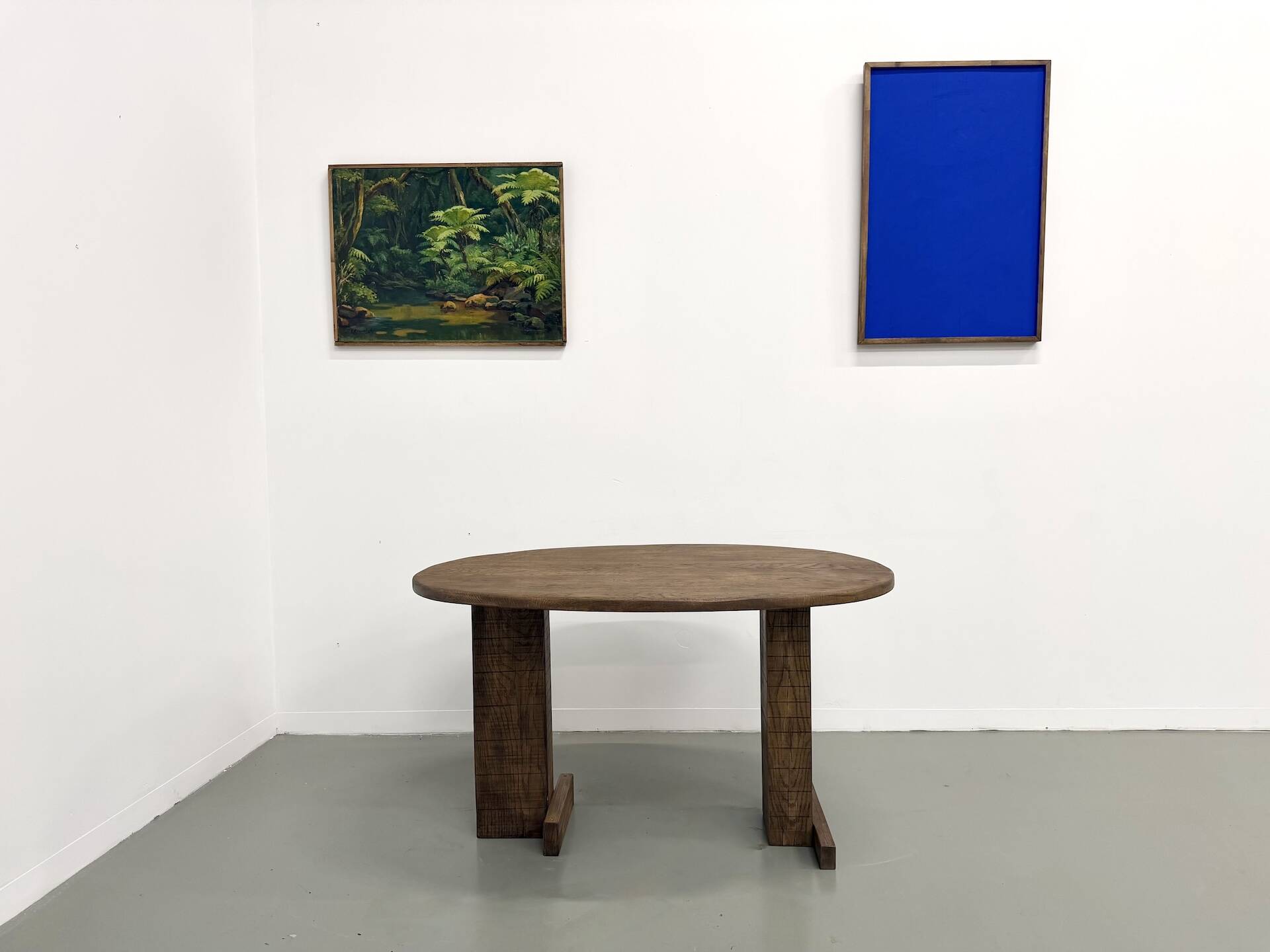 Oval table with T-shaped legs, solid oak, student woodworking project.