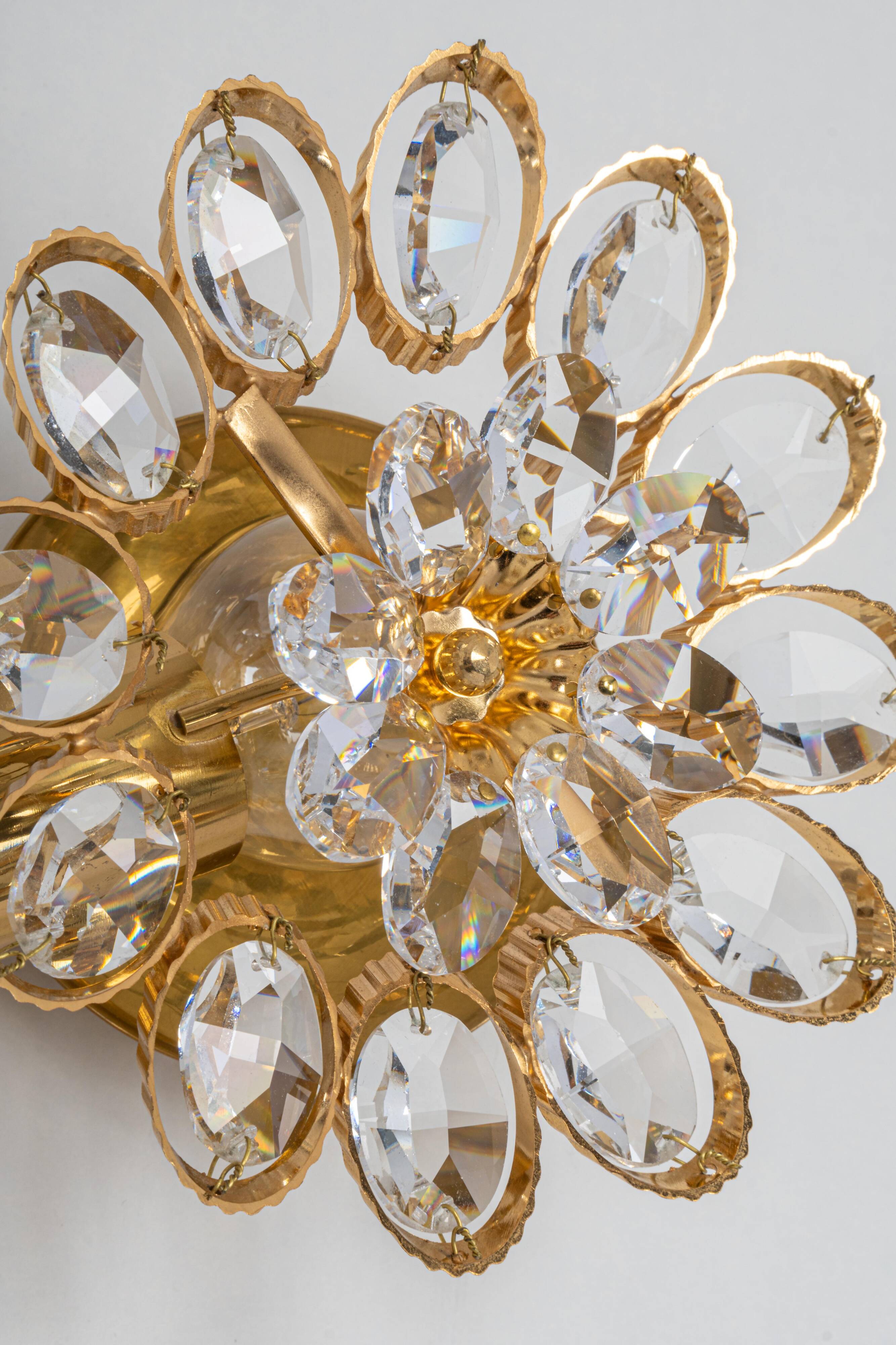 Sconce in gilded brass in the shape of a flower by Palwa, Germany, 1970s.