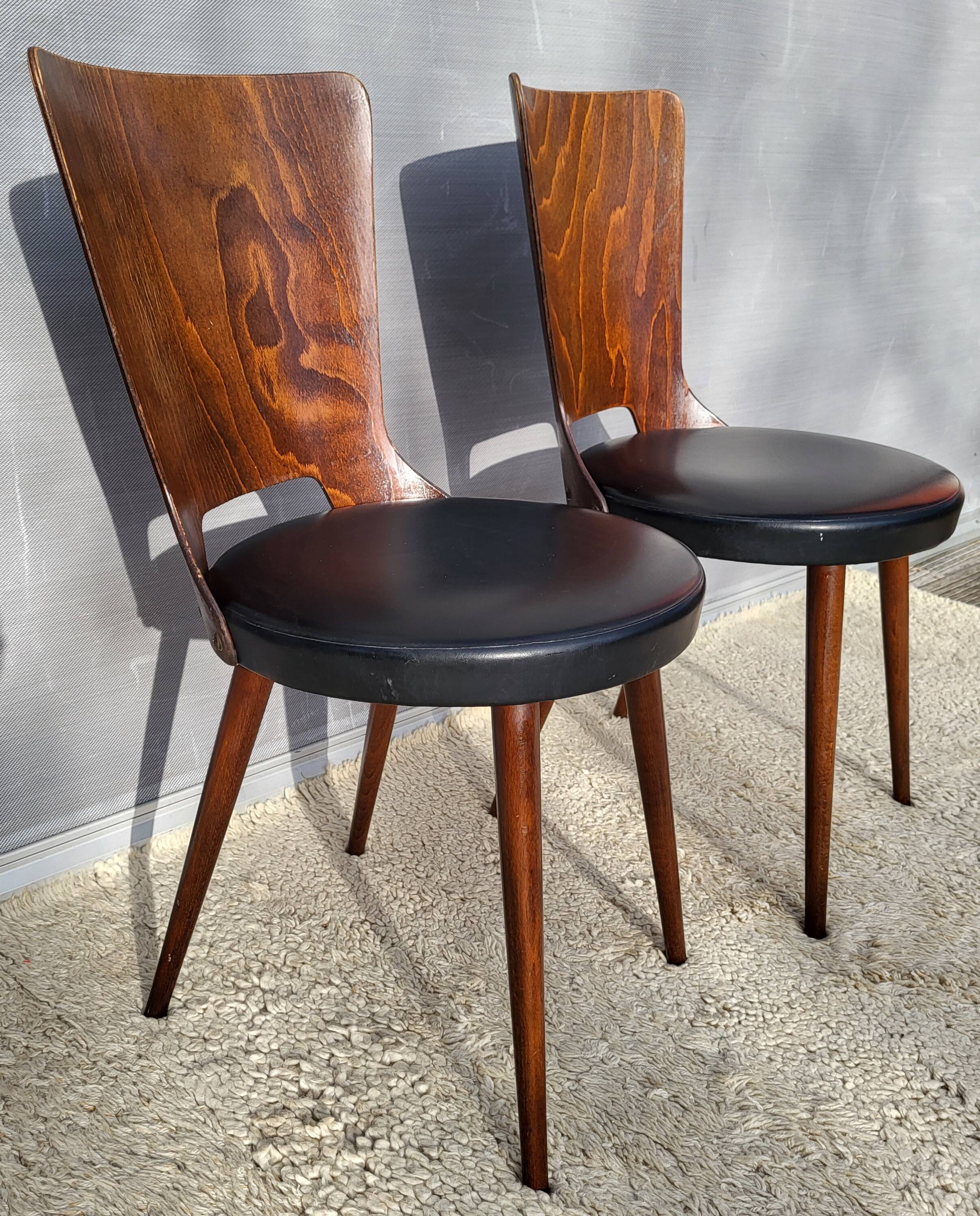 Pair of Dove chairs • Baumann • Black faux leather