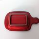 red glazed stoneware butter dish