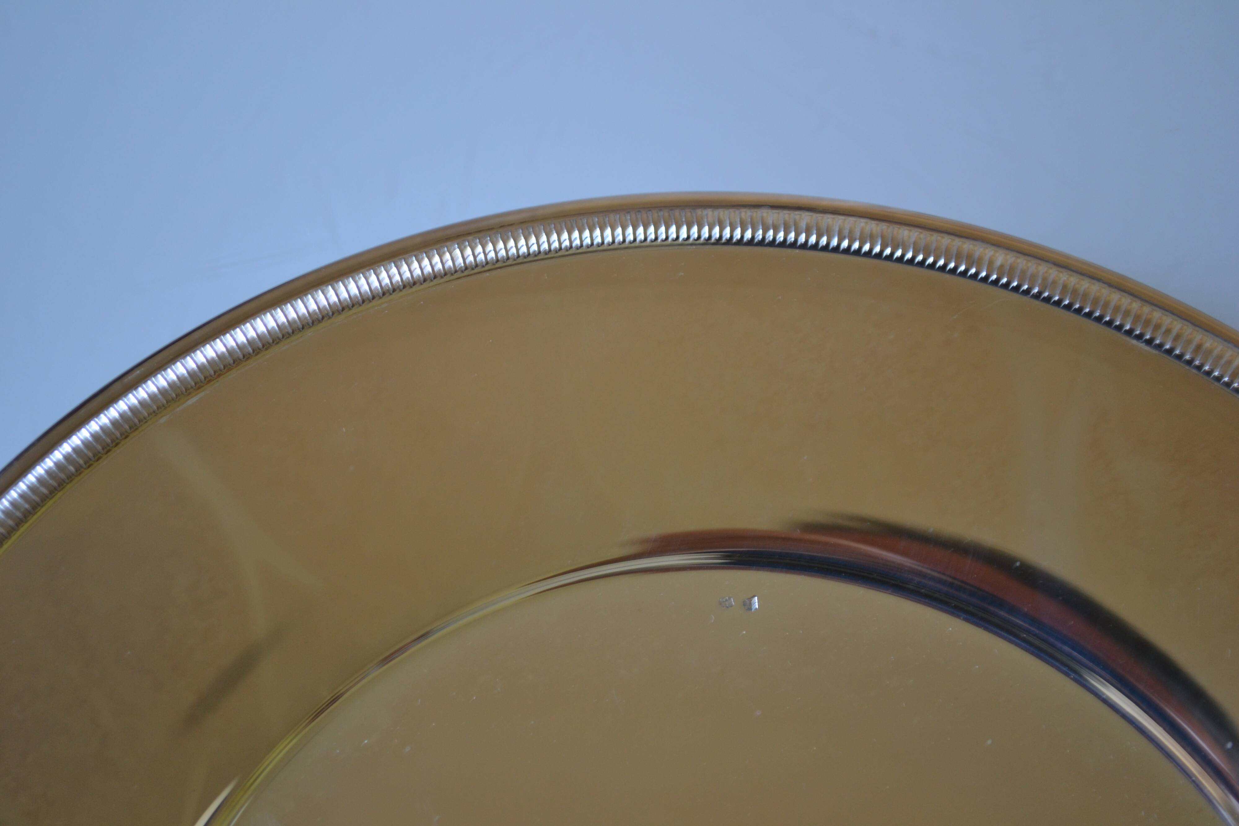 Round silver-plated serving plate or dish, diameter 30 cm.