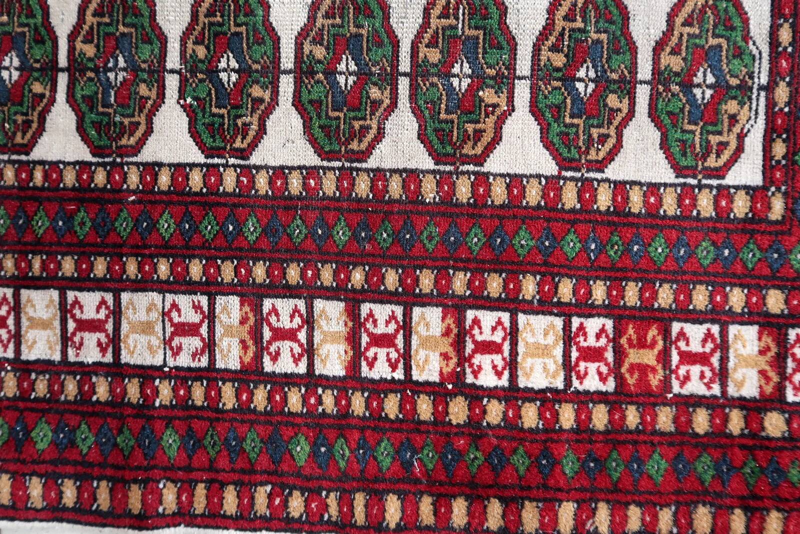 Handmade vintage Uzbek Bukhara rug 77cm x 128cm 1960s - 1С1175