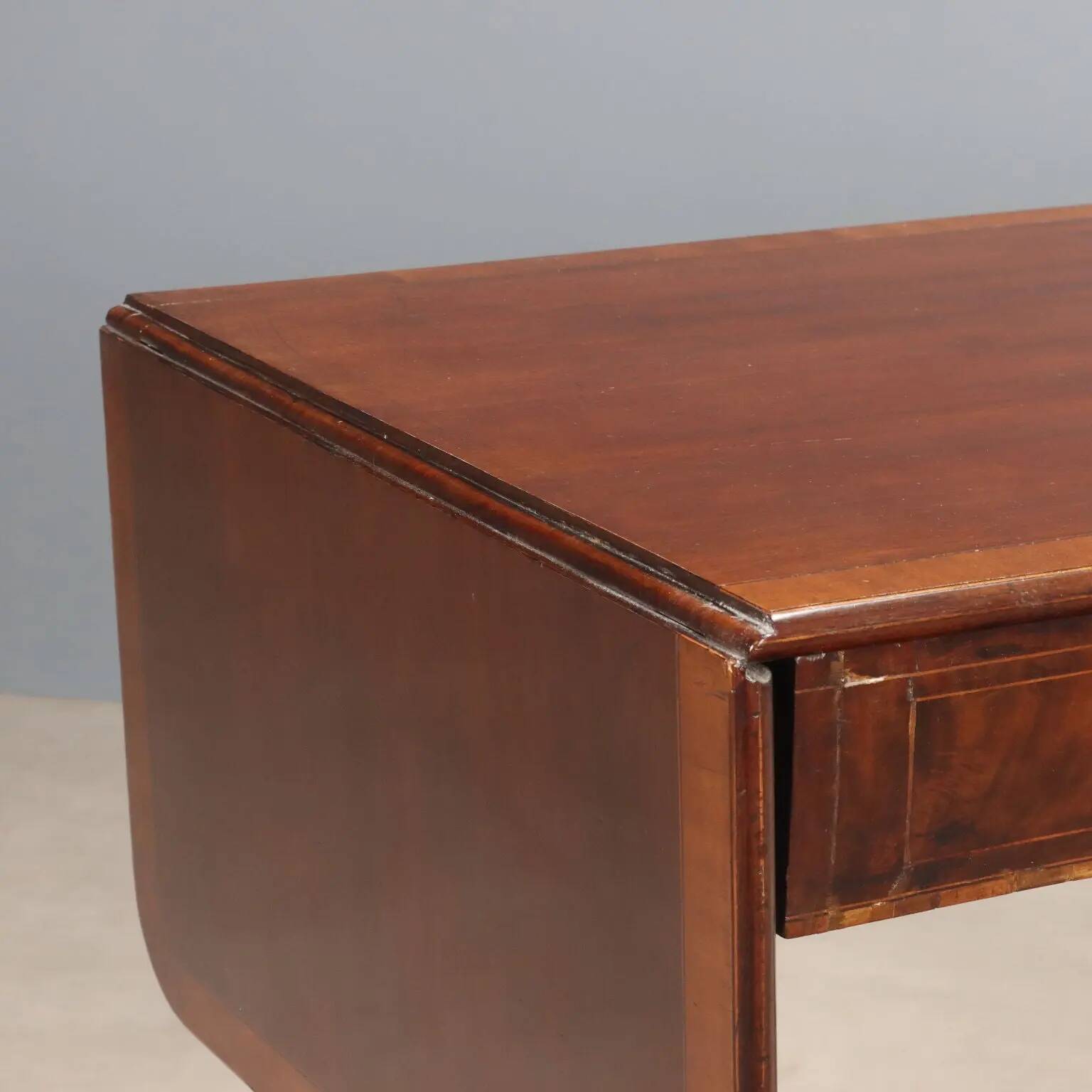 Antique mahogany desk with ebony and maple finishes, United Kingdom, 20th century.