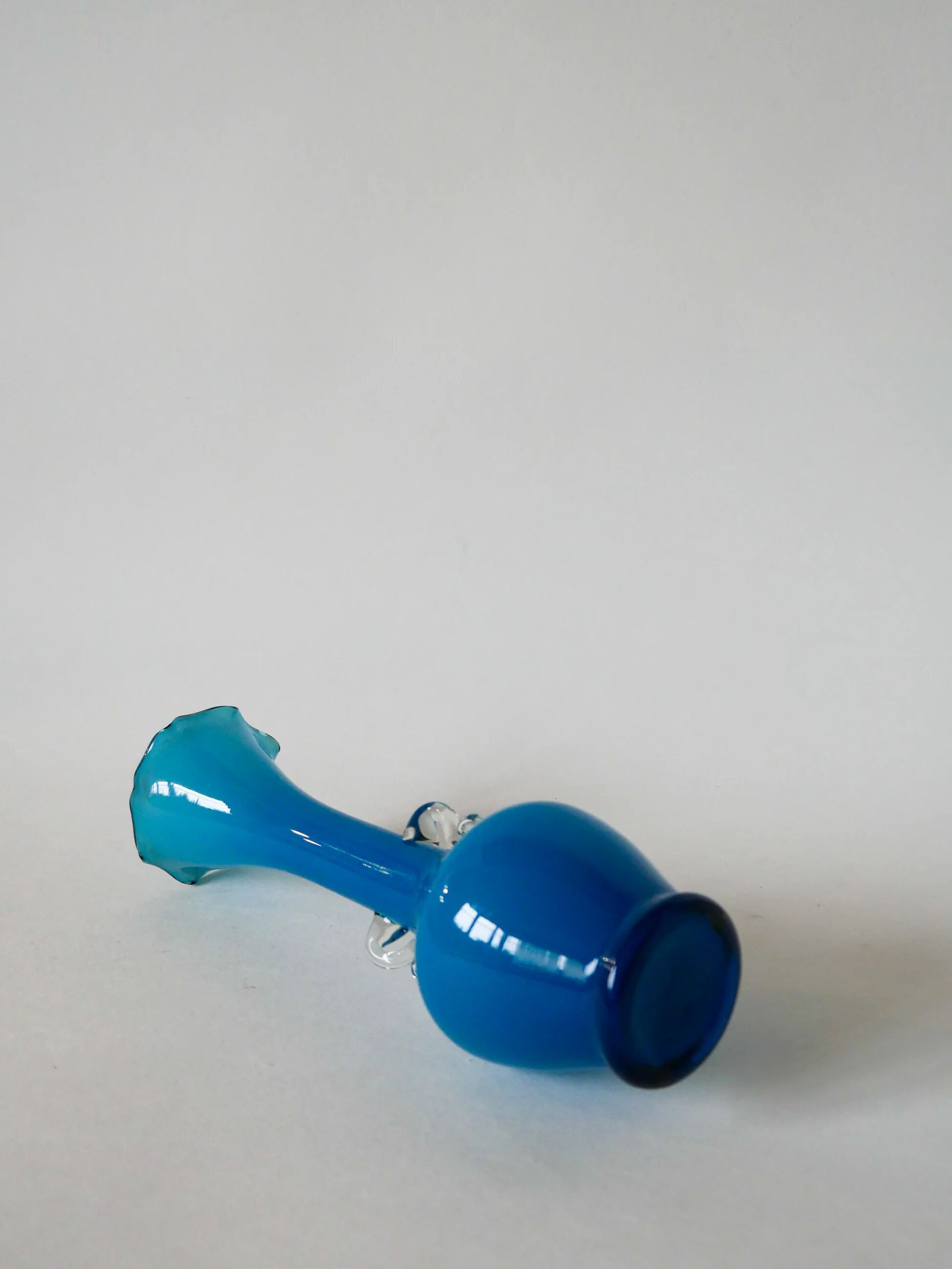 Sky blue opaline vase with scalloped edges and small handles, design from the 1960s.