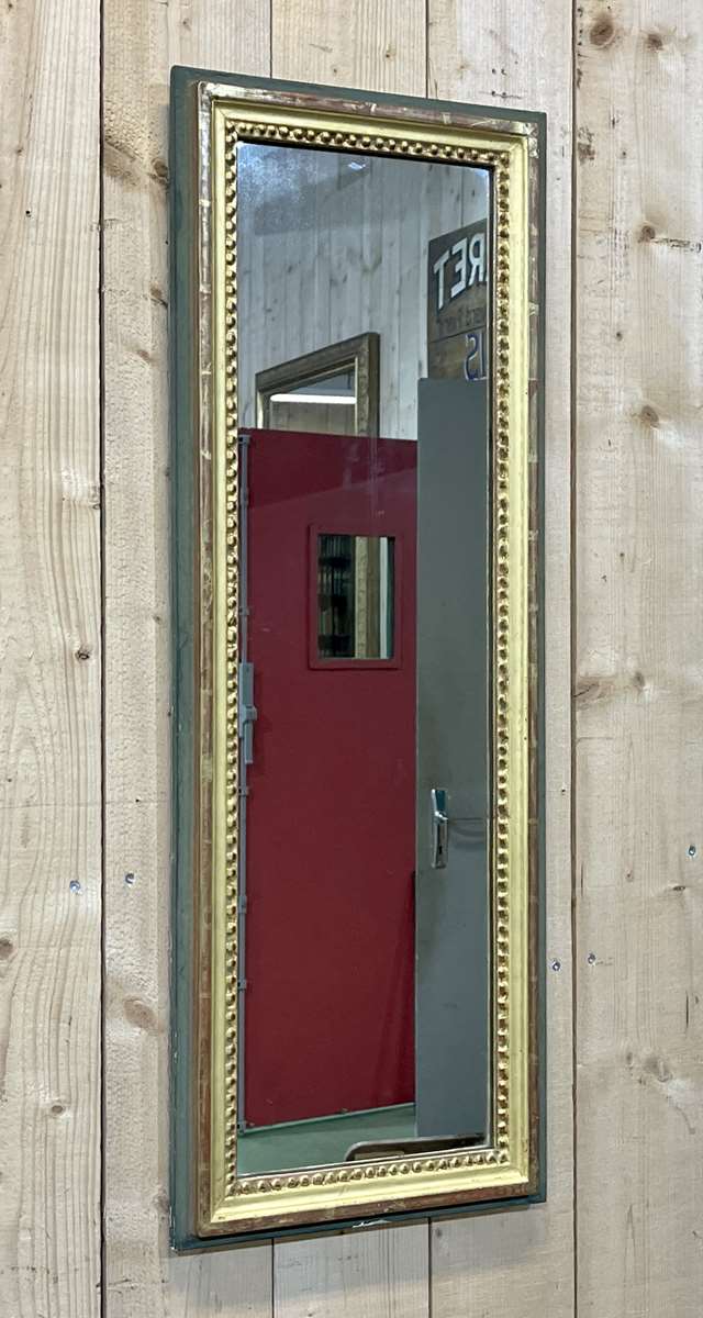 Mirror early twentieth in gilded wood